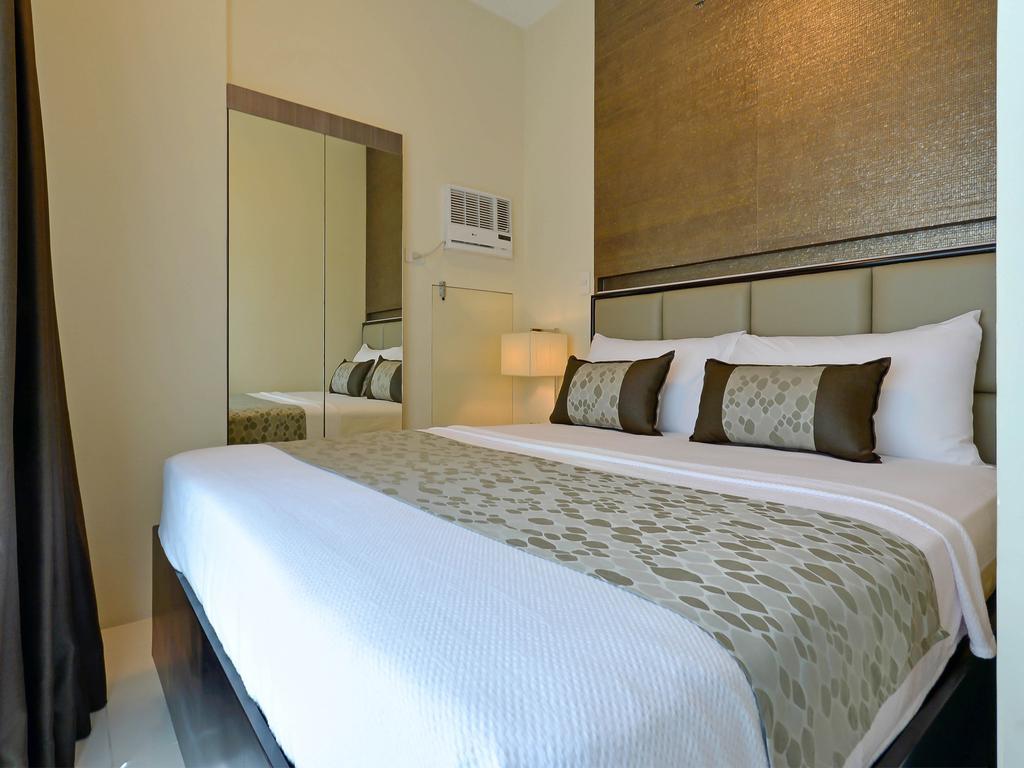 Currency Serviced Suites Manila Exterior foto