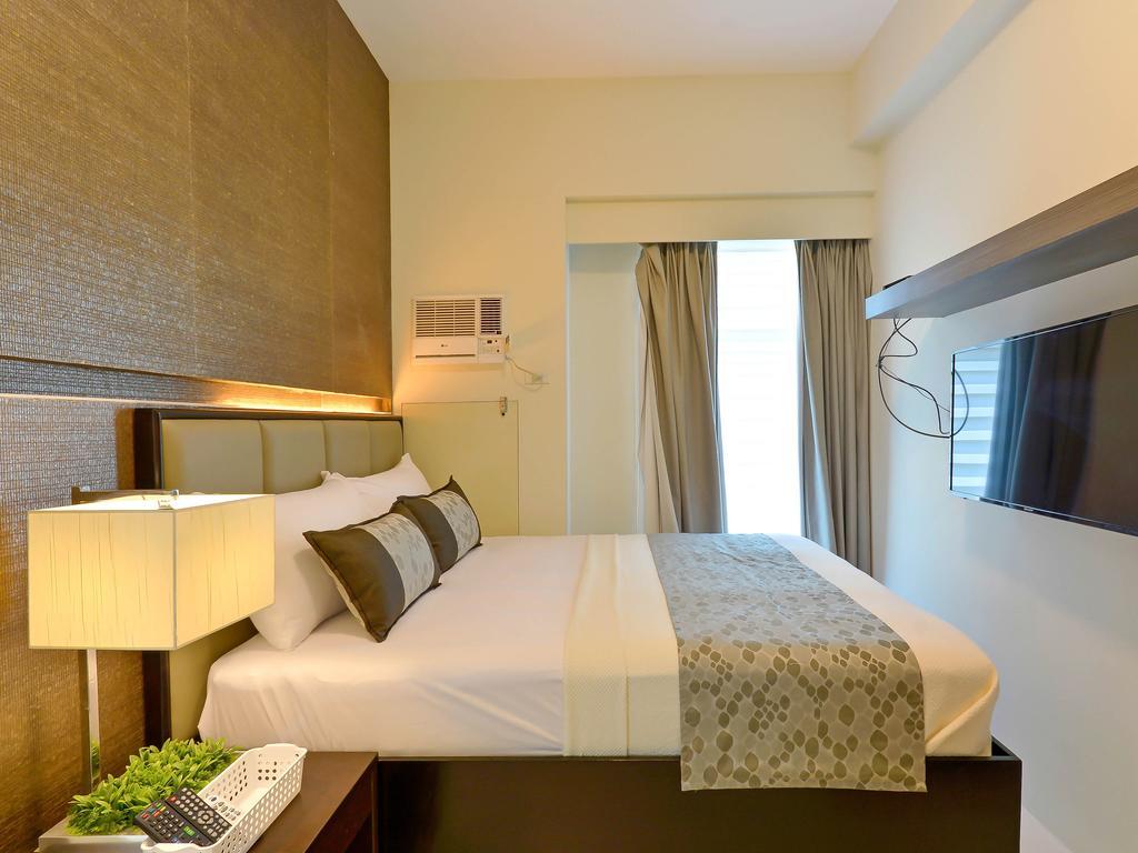 Currency Serviced Suites Manila Exterior foto